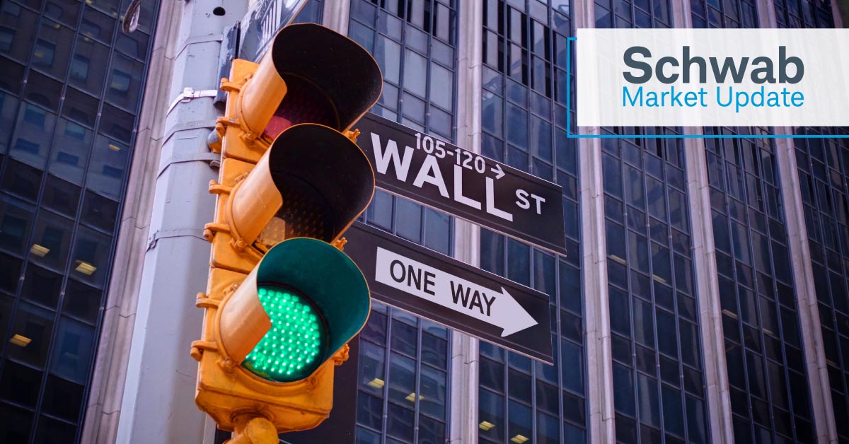 Green traffic light next to 105-120 Wall St One Way Schwab Market Update