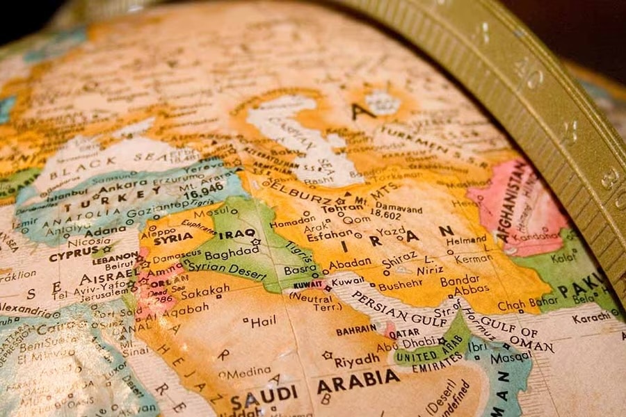 Globe showing the Middle East with Iran near the center.