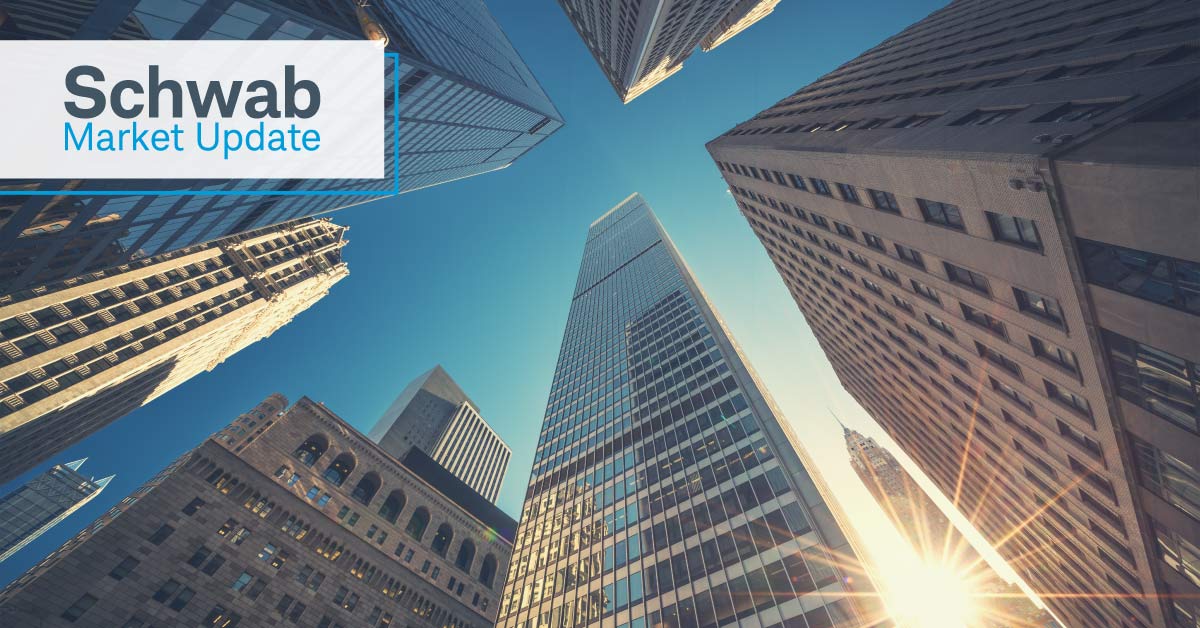 Schwab Market Update: A view of the tops of buildings on Wall Street.