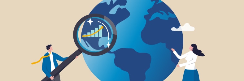 An illustration of two people examining a large globe with a magnifying glass showing a graph.